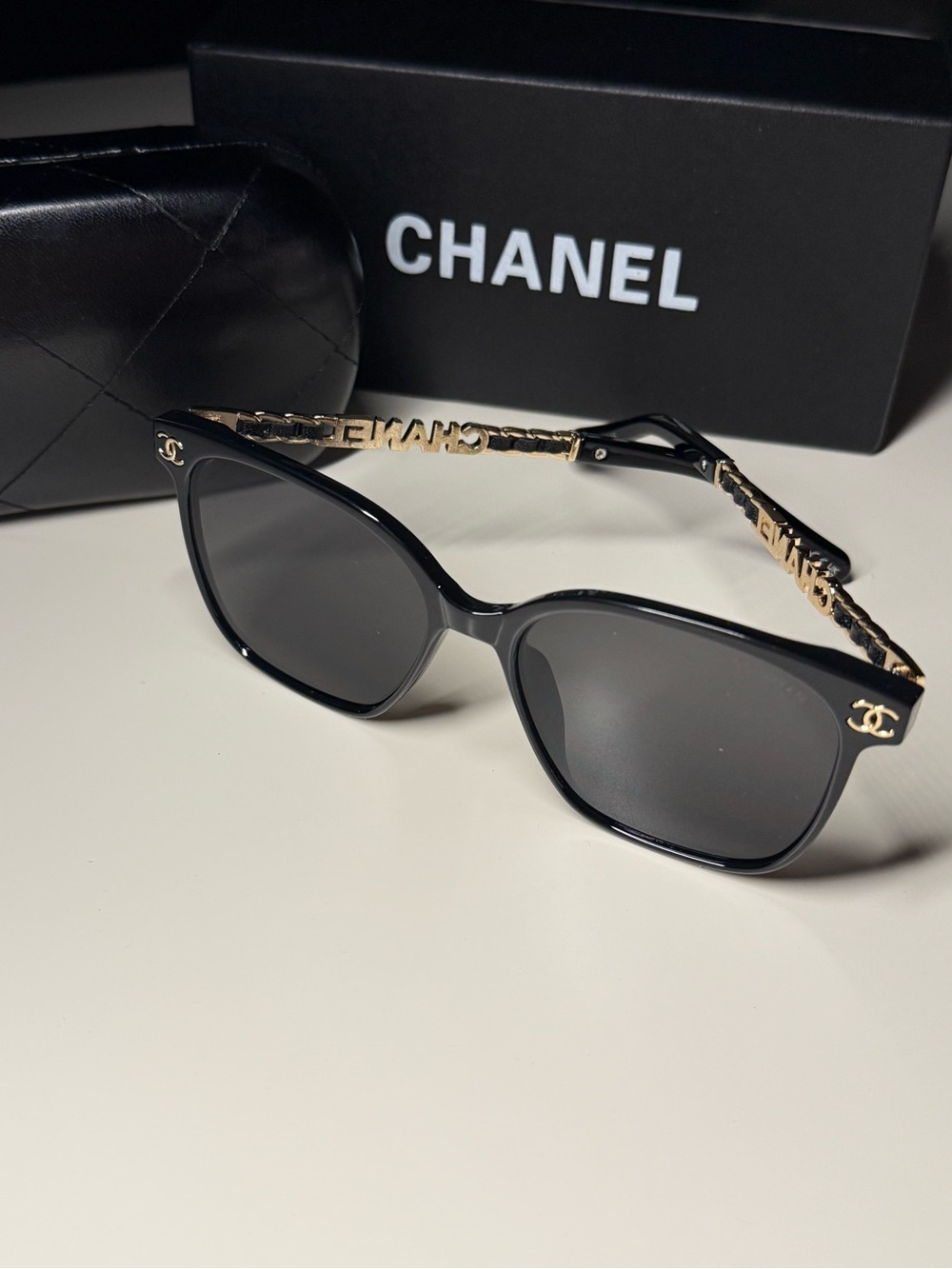CHANEL Black & Gold Sunglasses - Elegant Womenโs Designer Shades